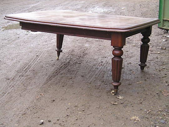 broken table with three legs